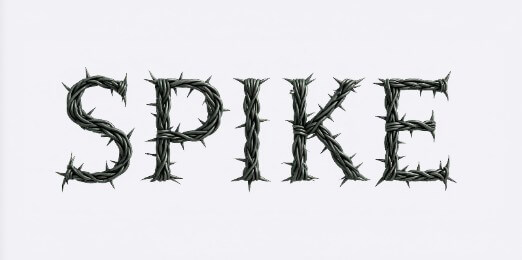 Barbed wire lettering with metal spikes.