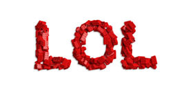 Lego pieces compose a word LOL.