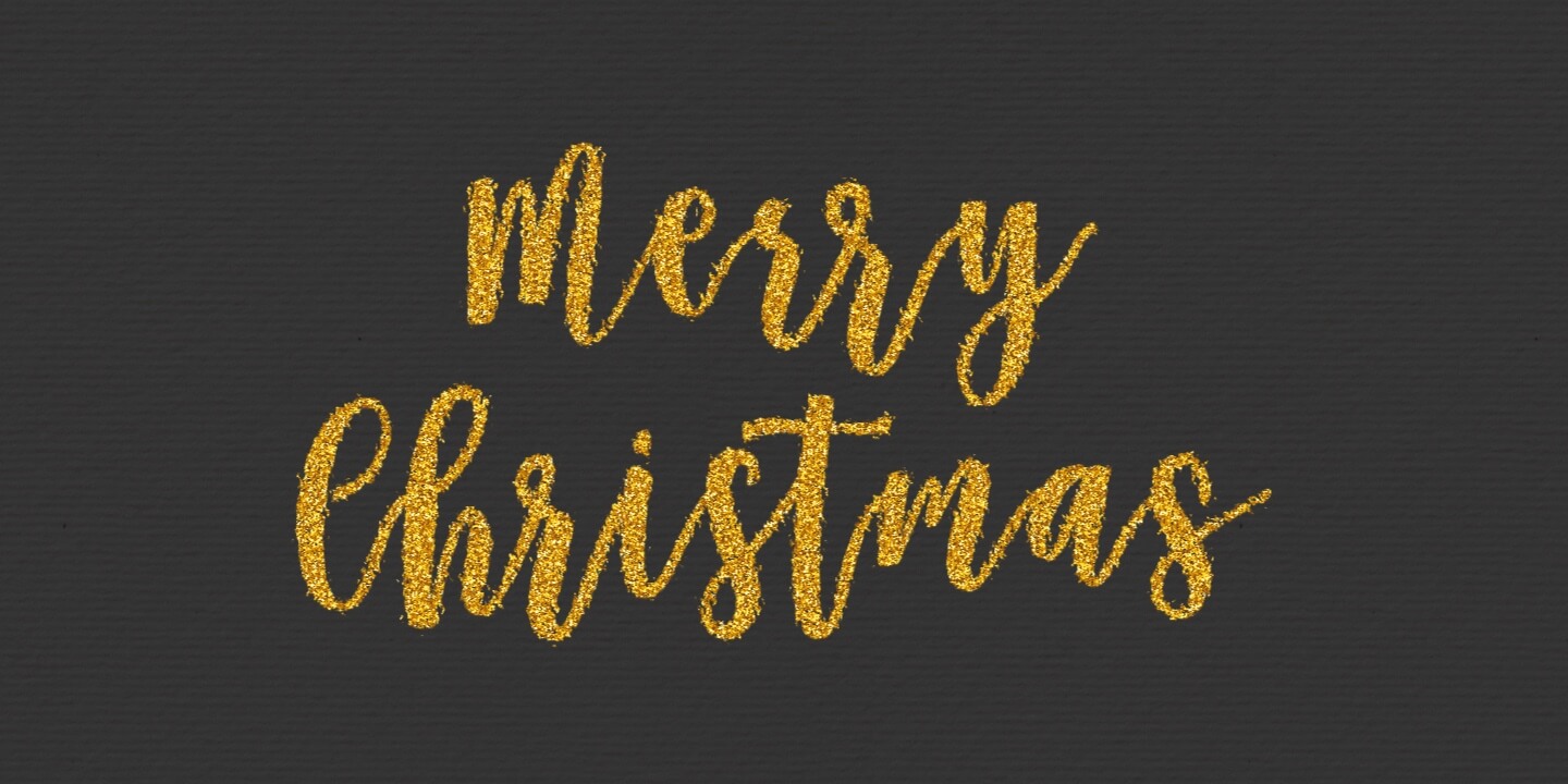 Merry Christmas written with shiny glitter text effect.
